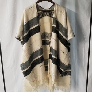 Multi colored, off white, striped poncho shawl